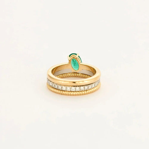 Bague 50 Bague multi-anneaux torsadés en or jaune, platine, diamants et émeraude 58 Facettes