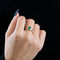 Bague 50 Bague multi-anneaux torsadés en or jaune, platine, diamants et émeraude 58 Facettes