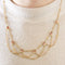 Collier Collier chaîne filigrane en or jaune 18K, rubis et saphirs roses 58 Facettes