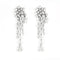 Boucles d'oreilles Boucles d'oreilles pendantes en or blanc 18 carats et diamants 58 Facettes