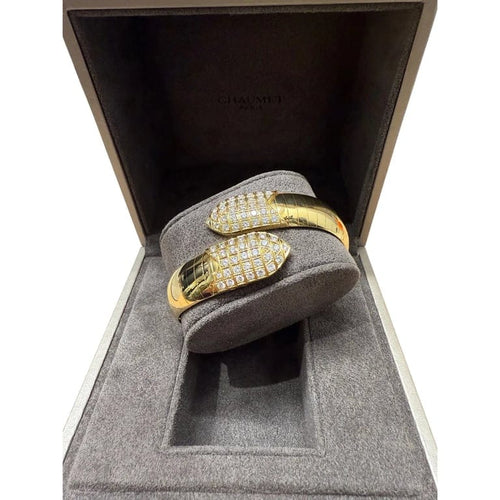 Bracelet Chaumet Plume - Bracelet en or jaune 18 carats et diamants 58 Facettes 1.0000453/1