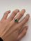 Bague 52 Bague en or blanc 18K sertie d’une émeraude 1 ct et diamants 58 Facettes