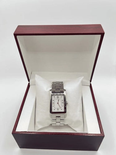 Montre Baume & Mercier Hampton MV045063 - Montre quartz en acier 24 x 40 mm 58 Facettes