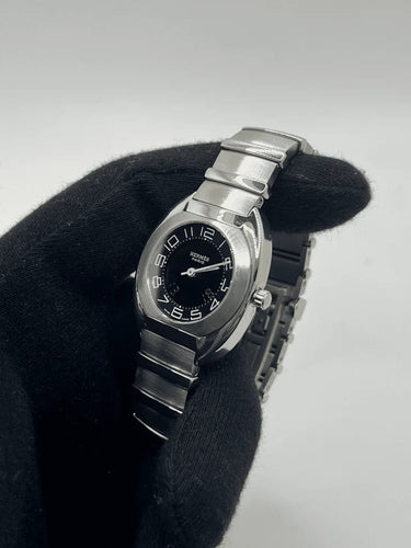 Montre Hermès Espace - Montre en acier, cadran noir, 32 mm 58 Facettes