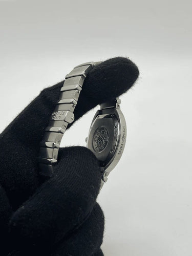 Montre Hermès Espace - Montre en acier, cadran noir, 32 mm 58 Facettes
