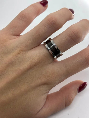Bague 52 Cartier - Bague vintage C de Cartier en or blanc 58 Facettes 1061