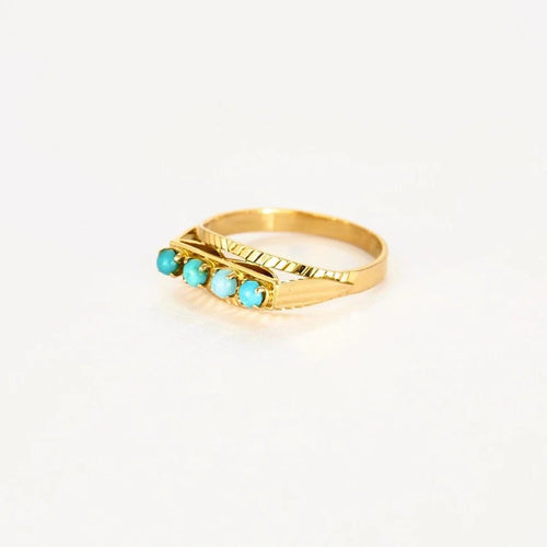 Bague 57 Bague jarretière en or rose et turquoises 58 Facettes