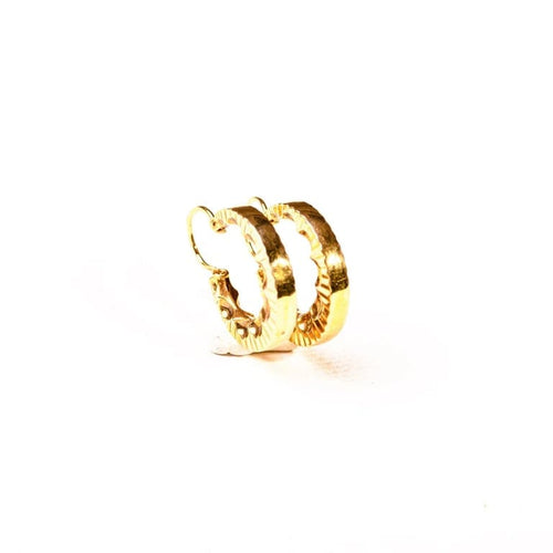 Boucles d'oreilles Boucles d’oreilles créoles à décor rayonnant en or jaune 18K 58 Facettes