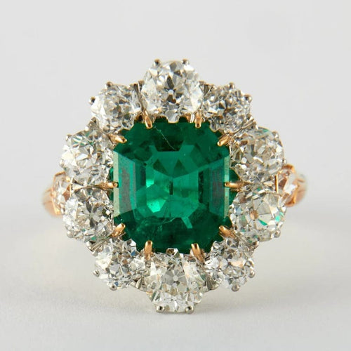Bague 51 Bague marguerite en or jaune avec émeraude et diamants 58 Facettes
