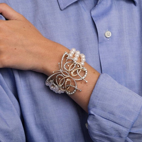 Bracelet Bracelet papillon en or blanc et or jaune avec perles Akoya et diamants 58 Facettes