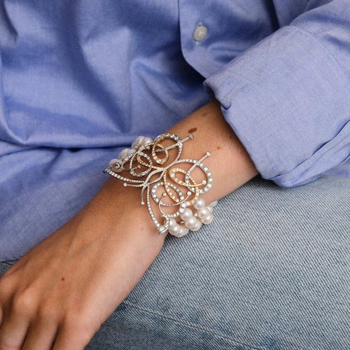 Bracelet Bracelet papillon en or blanc et or jaune avec perles Akoya et diamants 58 Facettes