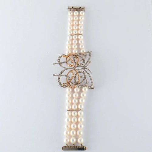 Bracelet Bracelet papillon en or blanc et or jaune avec perles Akoya et diamants 58 Facettes