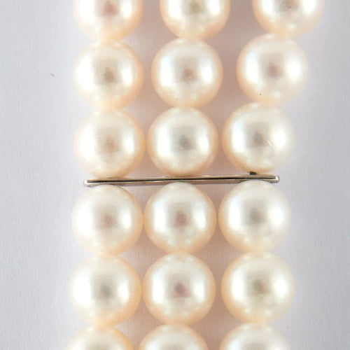 Bracelet Bracelet papillon en or blanc et or jaune avec perles Akoya et diamants 58 Facettes