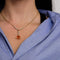 Collier Collier en or jaune avec grenats mandarine et diamants 58 Facettes