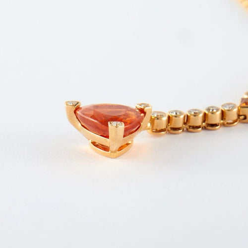Collier Collier en or jaune avec grenats mandarine et diamants 58 Facettes