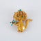 Broche Broche chat en or jaune 18k, turquoises, émeraudes et saphir 58 Facettes 2.173