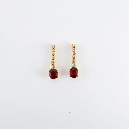 Boucles d'oreilles Boucles d'oreilles pendantes en or jaune 18K grenat mandarine et diamants 58 Facettes 2.586