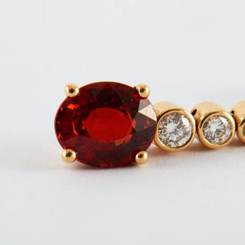 Boucles d'oreilles Boucles d'oreilles pendantes en or jaune 18K grenat mandarine et diamants 58 Facettes 2.586