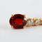 Boucles d'oreilles Boucles d'oreilles pendantes en or jaune 18K grenat mandarine et diamants 58 Facettes 2.586