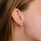 Boucles d'oreilles Boucles d’oreilles fleurs à clip en or jaune 18k, rubis birmans et diamants 58 Facettes 2.165