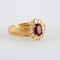 Bague 52.5 Bague marguerite en or jaune 18k avec rubis birman et diamants 58 Facettes 2.197