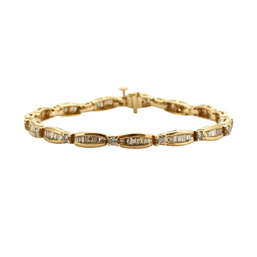 Bracelet Bracelet en or jaune 18k serti de diamants taille baguette 58 Facettes 1