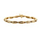 Bracelet Bracelet en or jaune 18k serti de diamants taille baguette 58 Facettes 1