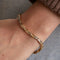 Bracelet Bracelet en or jaune 18k serti de diamants taille baguette 58 Facettes 1