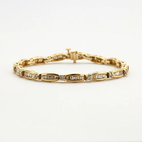 Bracelet Bracelet en or jaune 18k serti de diamants taille baguette 58 Facettes 1