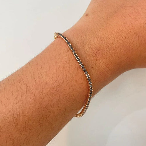 Bracelet Bracelet tennis en or jaune 18k serti de diamants noirs 58 Facettes