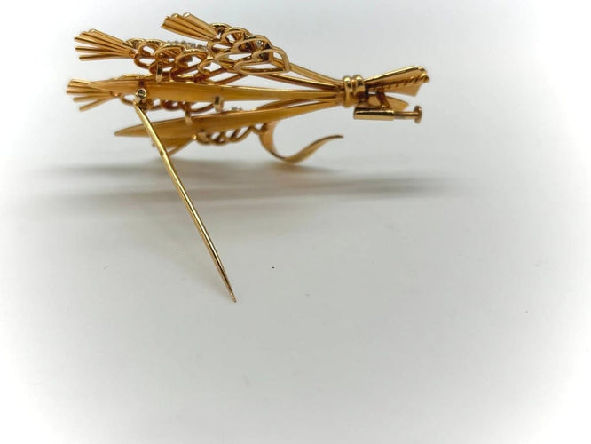 Broche Broche bouquet de fleurs en or jaune 18k et diamants 58 Facettes M8759