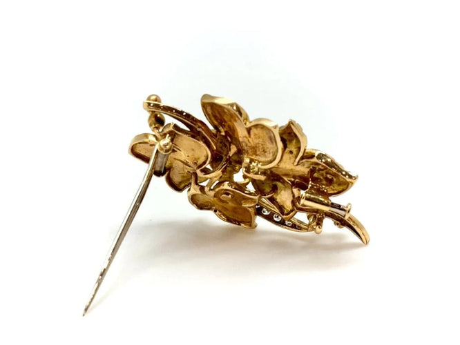 Broche Broche 4 feuilles en or jaune 18k et diamants 58 Facettes M9152
