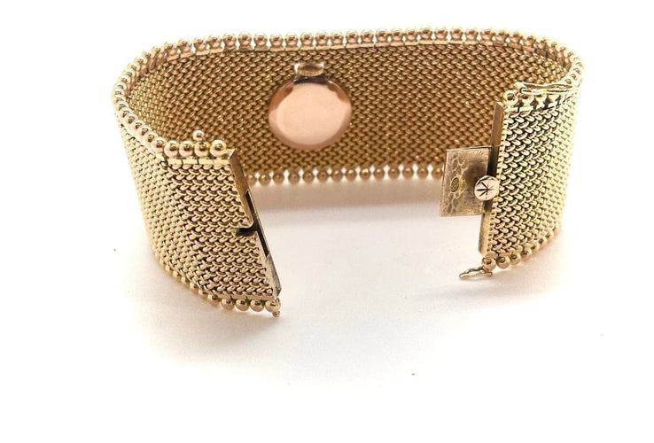 Montre Rolex - Montre bijou avec bracelet manchette en or jaune 18k 58 Facettes M9294