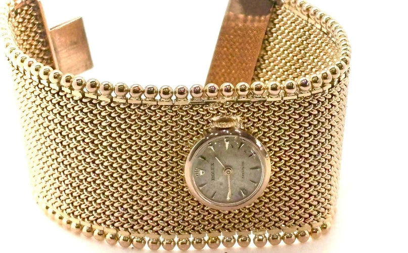 Montre Rolex - Montre bijou avec bracelet manchette en or jaune 18k 58 Facettes M9294
