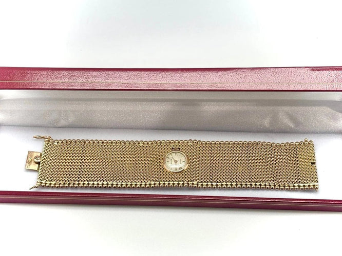Montre Rolex - Montre bijou avec bracelet manchette en or jaune 18k 58 Facettes M9294