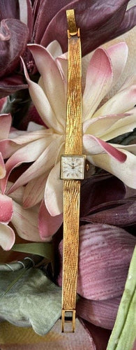 Montre Lip - Montre femme vintage en or jaune 18 carats 58 Facettes