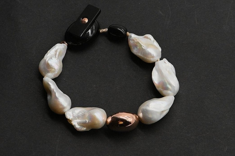 Bracelet Bracelet en perles baroques et or rose 18 carats 58 Facettes