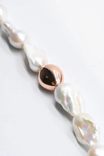 Bracelet Bracelet en perles baroques et or rose 18 carats 58 Facettes