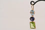Boucles d'oreilles Boucles d'oreilles pendantes en or rose 18 carats, topaze, iolite et péridot 58 Facettes