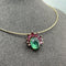 Collier Collier ras-de-cou - Tourmaline verte et grenats rhodolites en or jaune 18 kt 58 Facettes