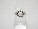 Bague 52 Bague marguerite vintage en or blanc 18 carats, perle et saphirs 58 Facettes