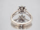 Bague 52 Bague marguerite vintage en or blanc 18 carats, perle et saphirs 58 Facettes