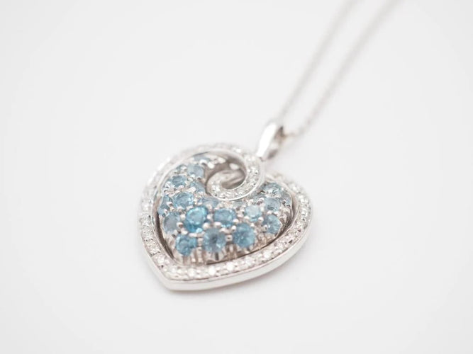 Collier Collier - Pendentif cœur en or blanc 750, diamants et topazes 58 Facettes