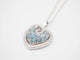 Collier Collier - Pendentif cœur en or blanc 750, diamants et topazes 58 Facettes
