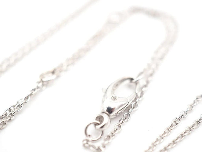 Collier Collier - Pendentif cœur en or blanc 750, diamants et topazes 58 Facettes
