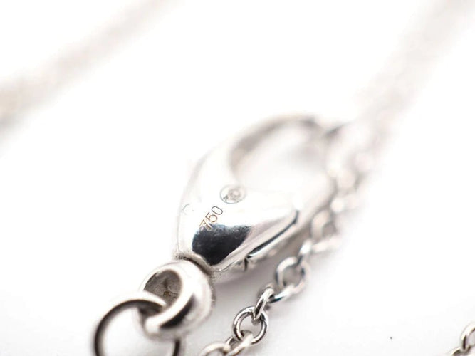 Collier Collier - Pendentif cœur en or blanc 750, diamants et topazes 58 Facettes