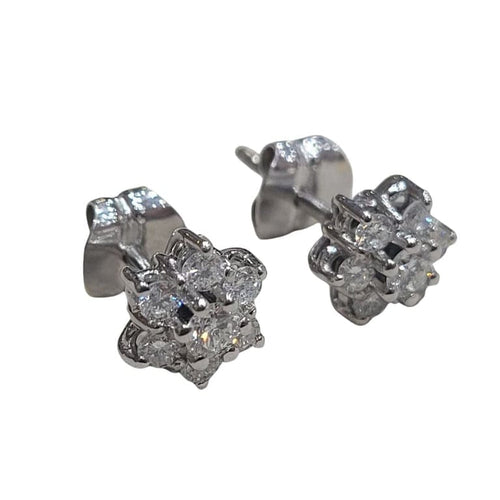 Boucles d'oreilles Boucles d’oreilles en or blanc 18 carats et diamants 58 Facettes PE46