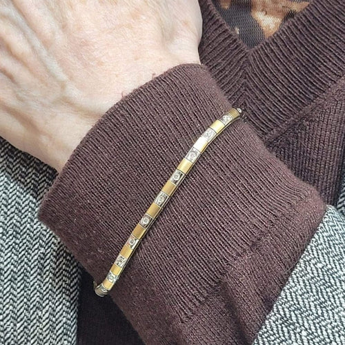 Bracelet Bracelet en or jaune et blanc 18 carats avec diamants 58 Facettes P99