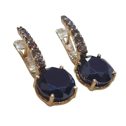 Boucles d'oreilles Boucles d’oreilles en or rose 18 carats avec diamants noirs et bruns 58 Facettes PE518
