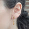 Boucles d'oreilles Boucles d’oreilles en or jaune 18 carats, citrines et péridots 58 Facettes PE780